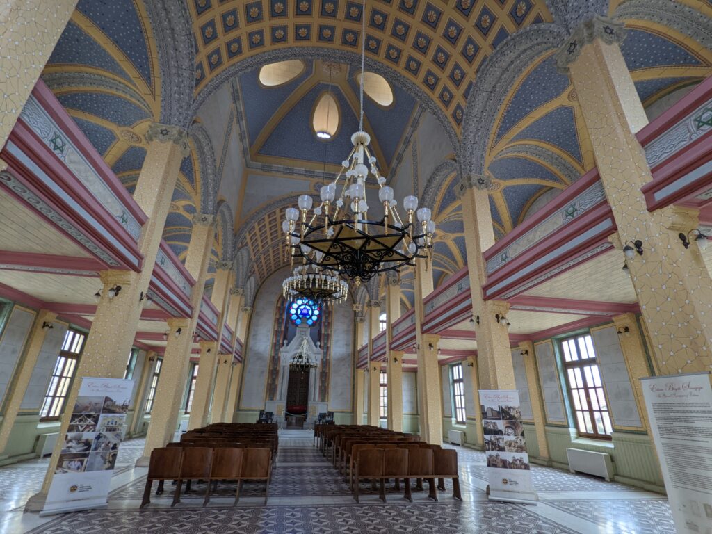 Grand Synagogue of Edirne, aka Adrianople Synagogue. The 1905 Great Fire of Adrianople destroyed more than 1,500 houses and also damaged several synagogues in the city. Following the permission of the Ottoman Government and the edict of Sultan Abdul Hamid II, the construction of this synagogue began an year after. Designed by the French architect France Depré, in 1938 the synagogue was abandoned after most of the Jewish community left the city and reopened in 2015 after 5 years of restoration work.
