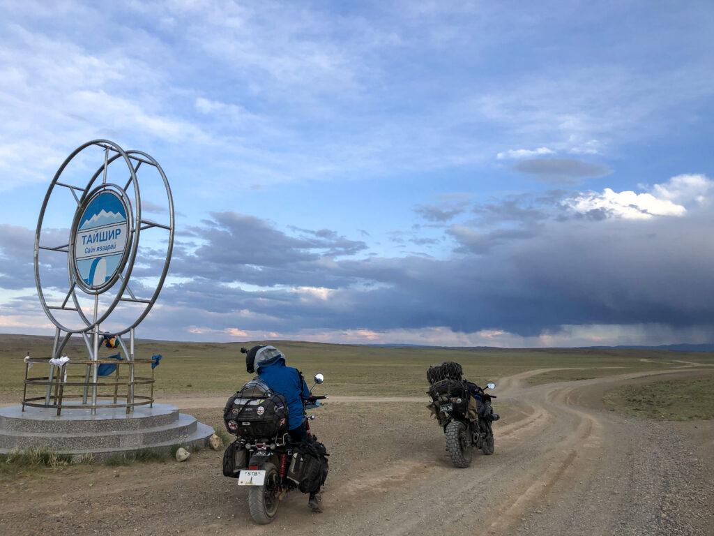 Nearing the end of our first day together in Taishur, Mongolia_ searching for a place to camp as storm clouds roll over the horizon